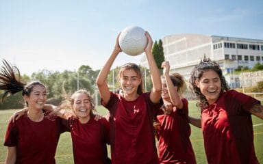 girls playing soccer